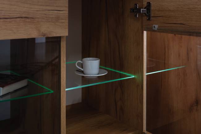 Тумба ТВ Арчи 10.85 цвет дуб крафт золотой/камень тёмный, есть подсветка за стеклом по торцу полки